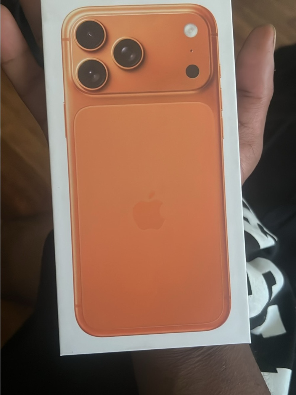 Apple iPhone 17 Pro Max – Cosmic Orange and White